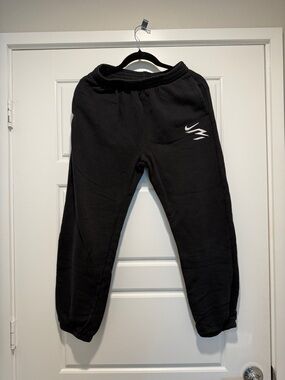 Nike Kids Black Jogger Sweatpants with White Swoosh